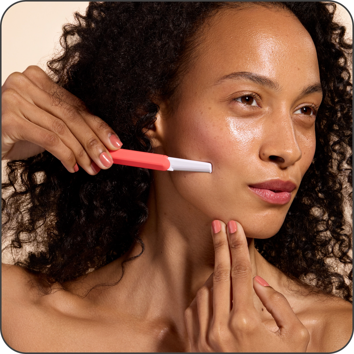 Woman using facial razor